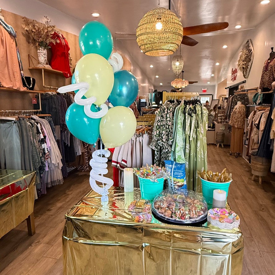 Boutique-themed custom helium balloon design