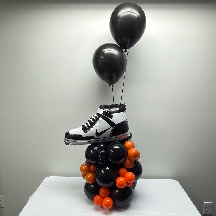 Sneaker-themed custom helium balloon design